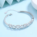 Amy and Annette 14K White Gold Hearts Bangle Adjustable Bracelet with crystals from Swarovski in 14K White Gold Plated